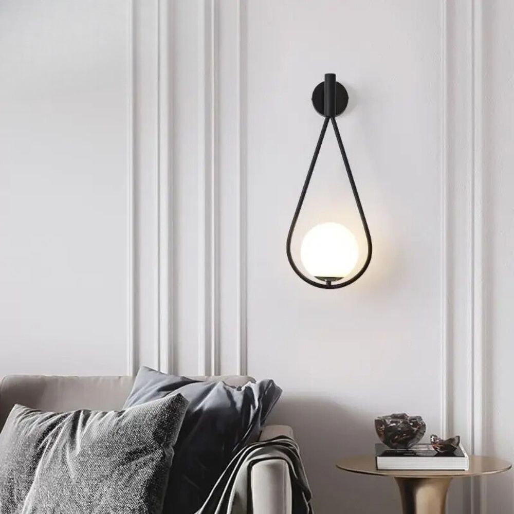 Modern Gold Wall Sconce with Frosted Glass Globe