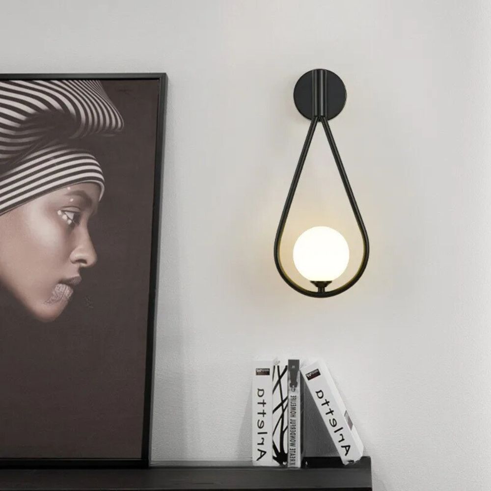 Modern Gold Wall Sconce with Frosted Glass Globe